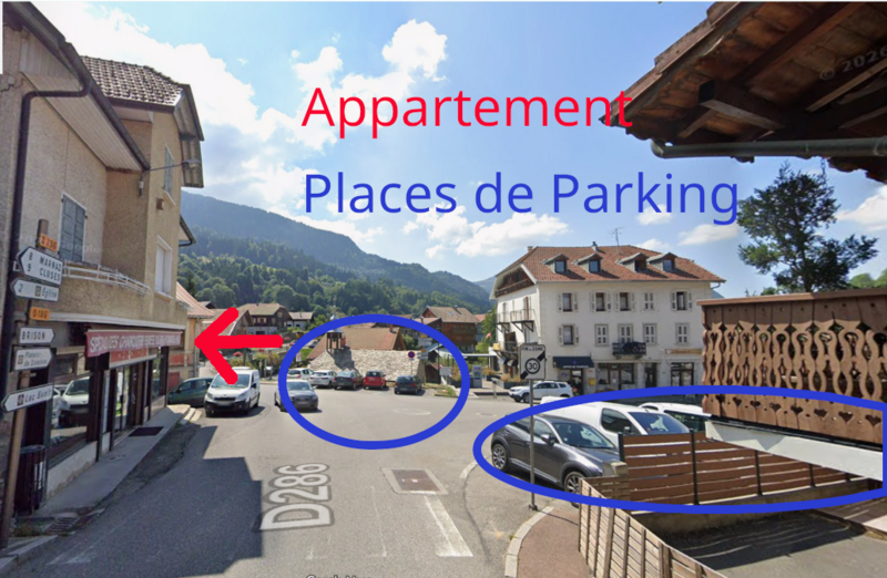 Vue d'ensemble : places de parking devant l'immeuble